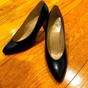Bruno Magli navy leather pumps.